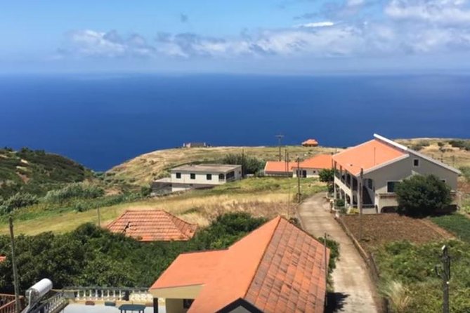 Fishing Villages - Southwest Tour - Prazeres: church-centered village life and old basalt house texture