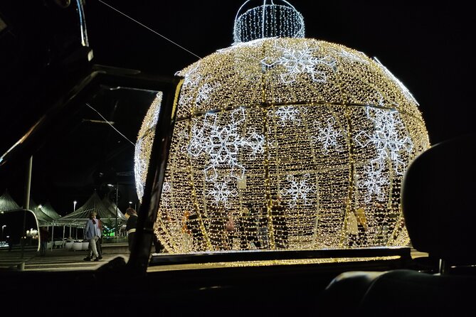 Funchal: Christmas Lights Sightseeing Night Tour - Comfort in December: hat, jacket, scarf, and windy evenings