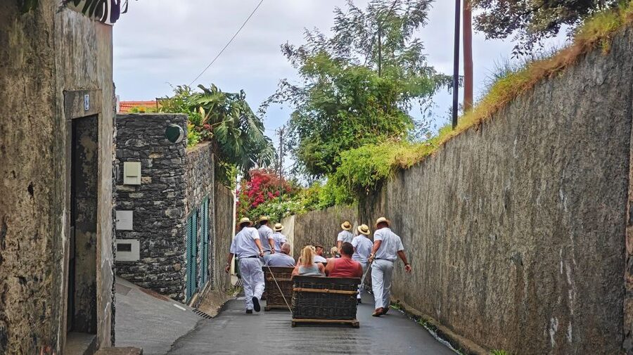 Funchal: Monte Toboggan and Old Town Tour by Tuk-Tuk - Buying basket cart tickets and the 2-kilometer descent