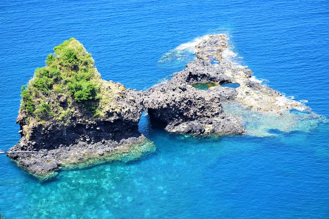 Go West - The most popular tour - Stop 6: Seixal—black sand beach and calm coastal views