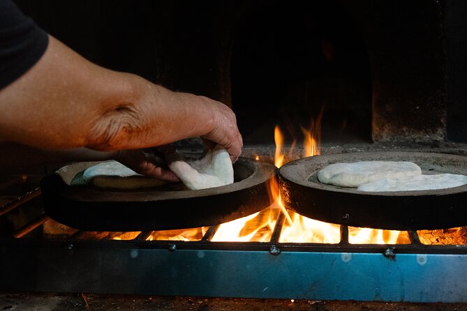 Hands-On Bolo do Caco Baking Class with a Madeiran Family - Meet the family kitchen: Tonia, her aunt, and an expert mother